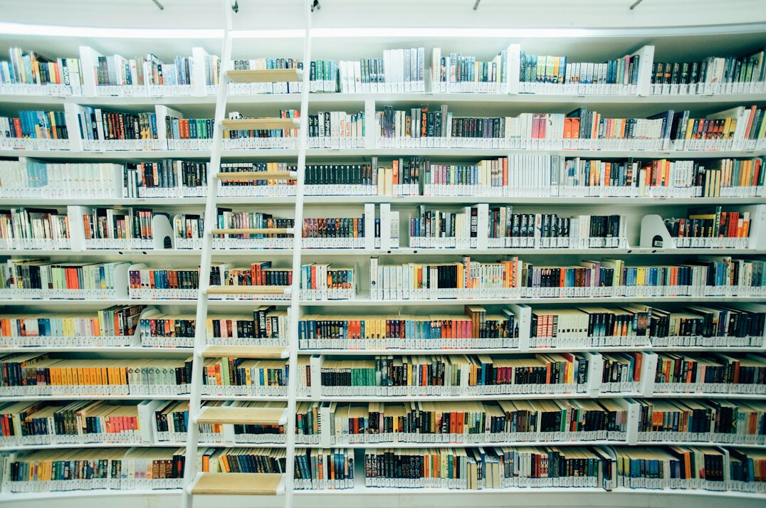 Quiet library archive with tall wooden shelves