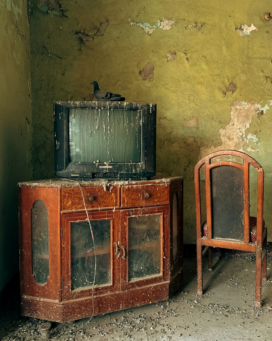 Vintage cathode ray tube television set in a wooden cabinet